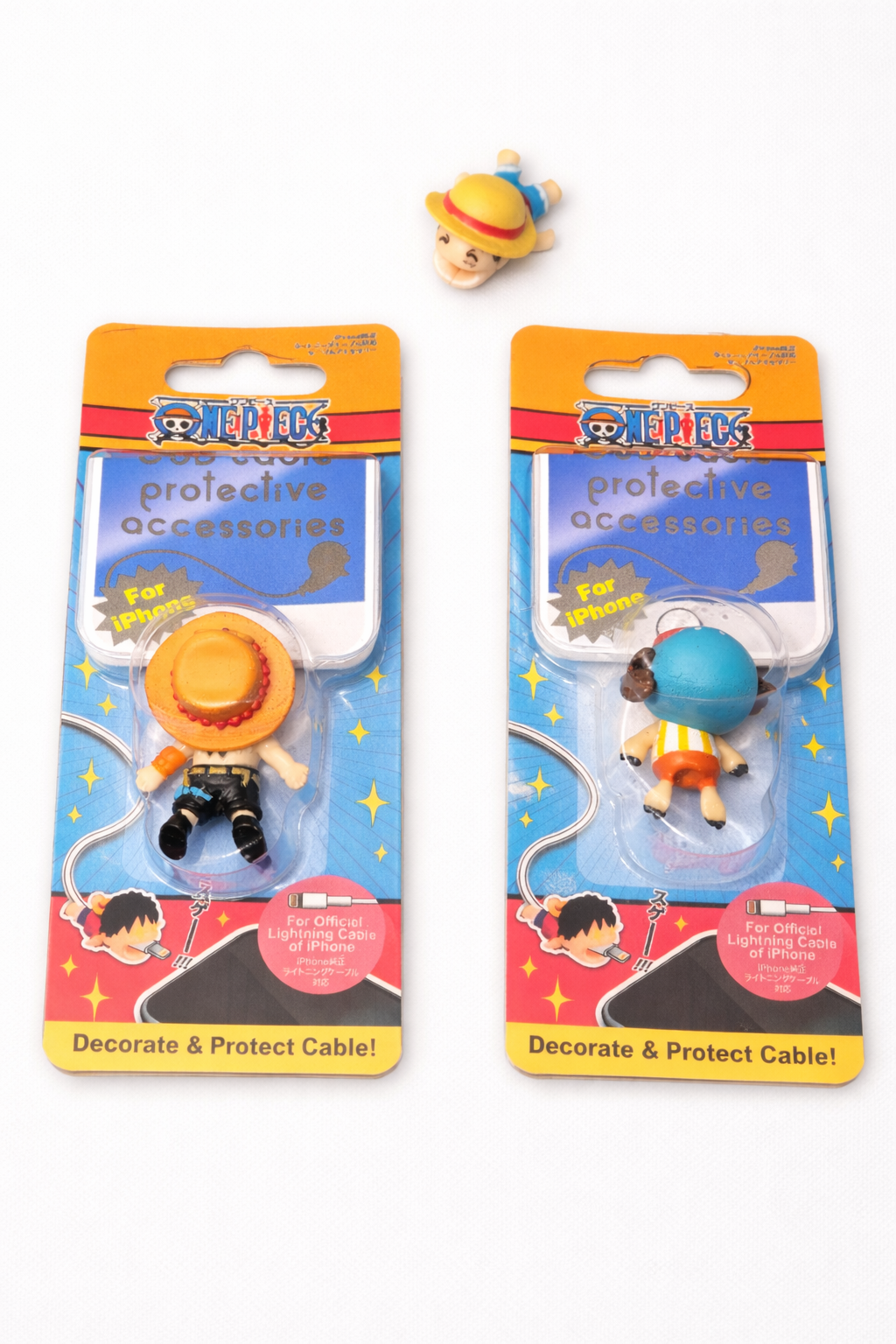 Figurine cache-prise pour câble de téléphone
